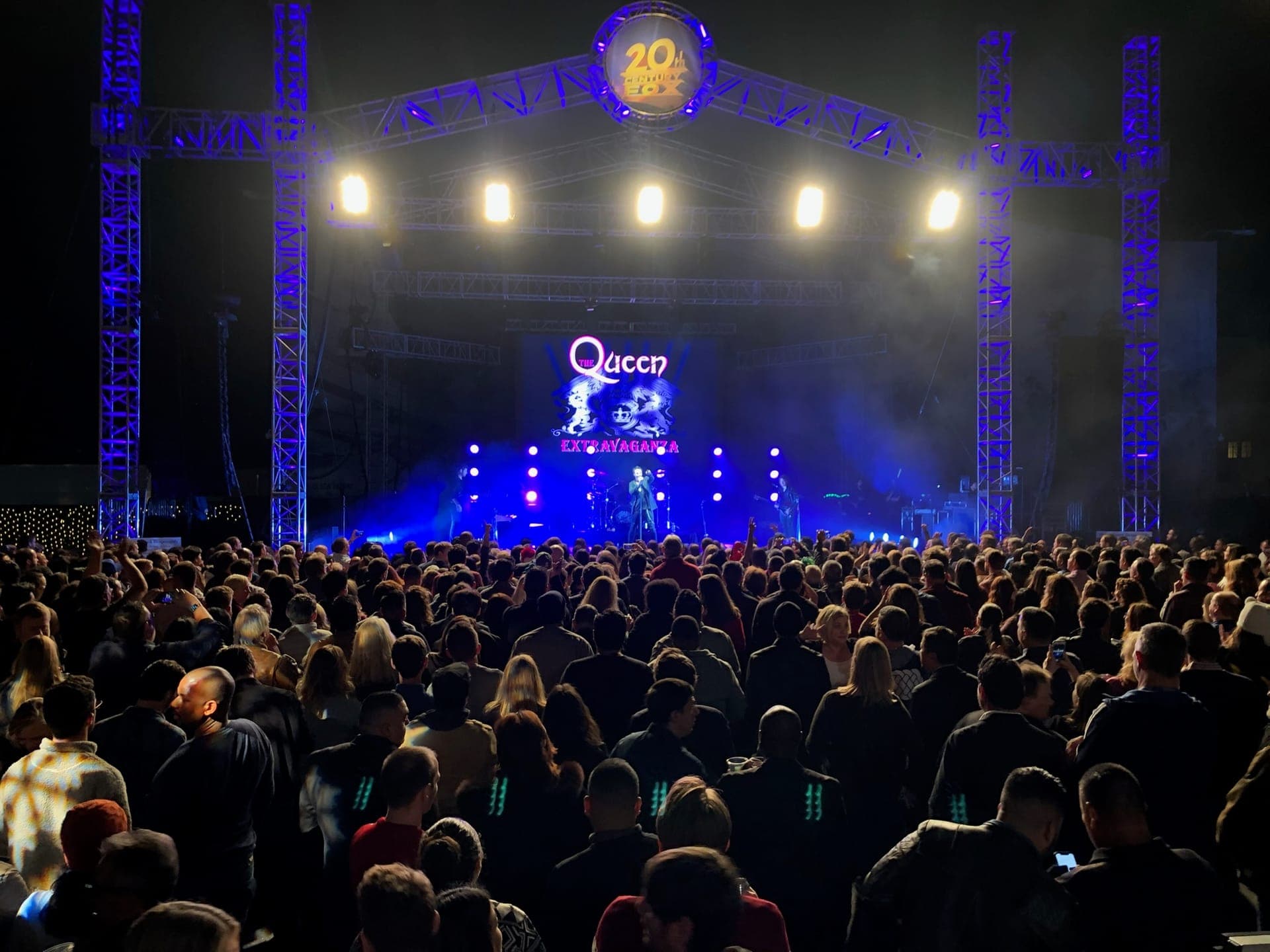 A full concert stage with truss and lighting on a studio lot